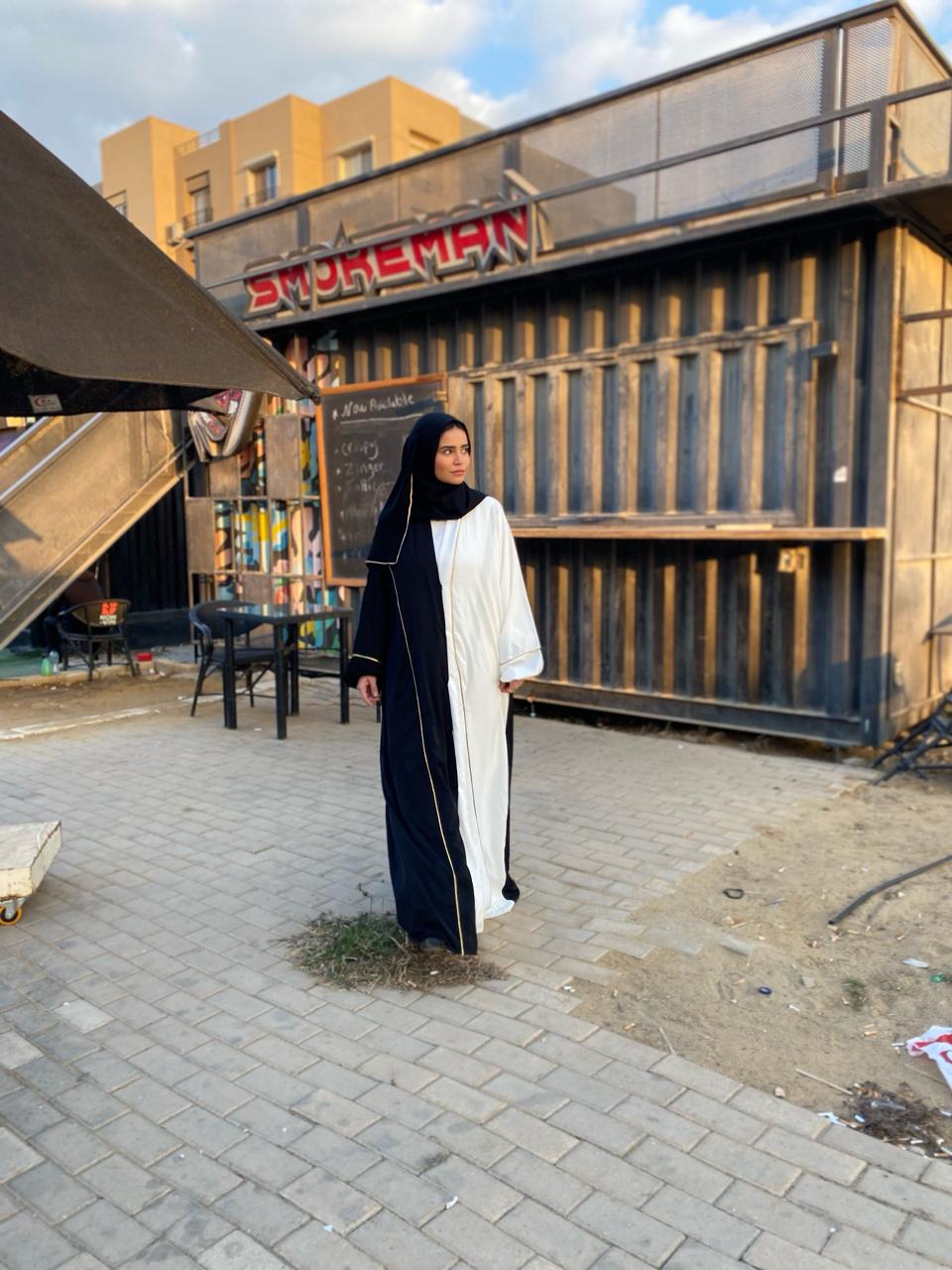 white black abaya